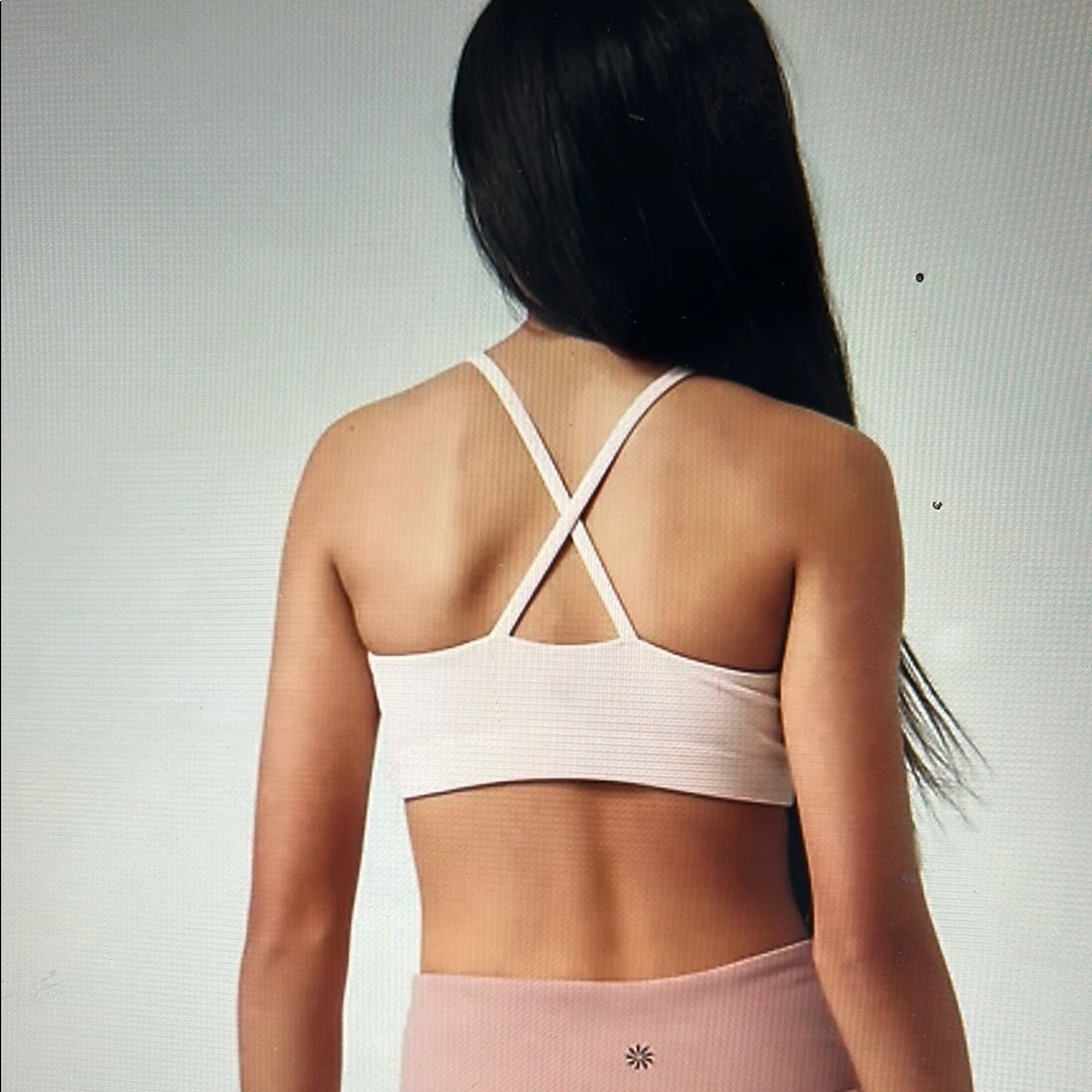 ATHLETA GIRL TAKE IT EASY BRA” Light pink with hair tie, size 6